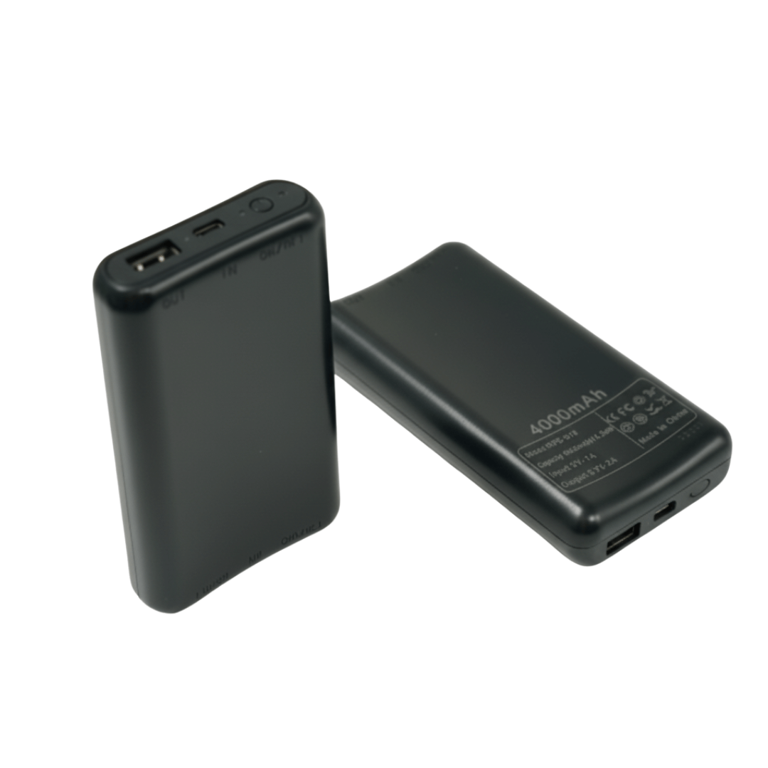 Two black battery packs on a white background, one standing to show its ports, one lying flat 1