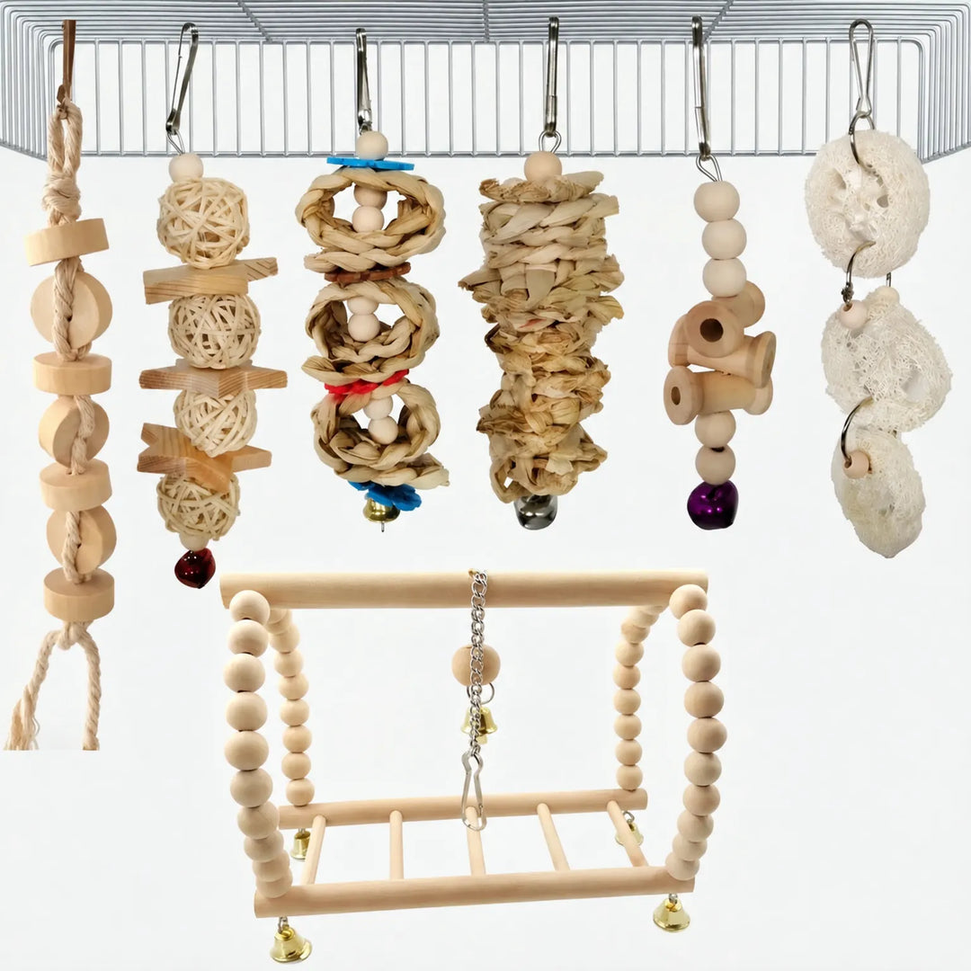 Natural-toned chewing toys hanging from a cage roof: wooden blocks, rattan balls, woven leaf, loofah slices and a beaded swing frame. 6