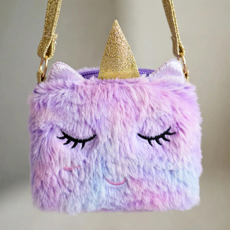 Close-up of a fluffy purple unicorn shoulder bag with a glittery gold horn and strap 3