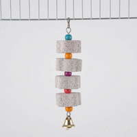 Version with four stone blocks alternating with blue, orange, purple, red and orange beads, ending in a brass bell, clipped to cage wire. 8