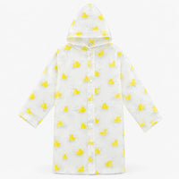 Flat lay of the clear hooded raincoat covered in yellow rubber ducks and bubbles, with snap buttons down the front. 7