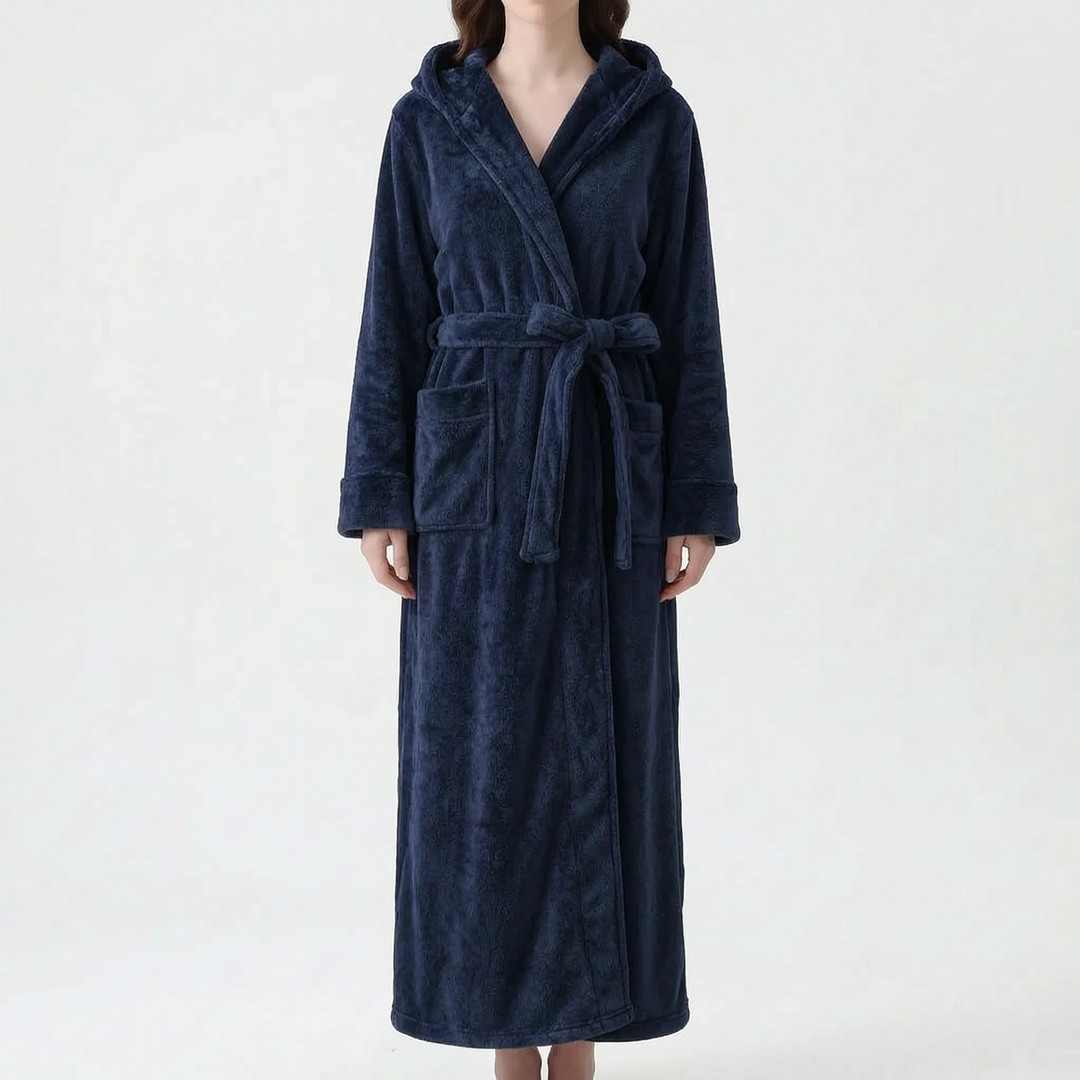 Front view of the robe in navy blue with a soft textured finish, hooded and belted with patch pockets. 10
