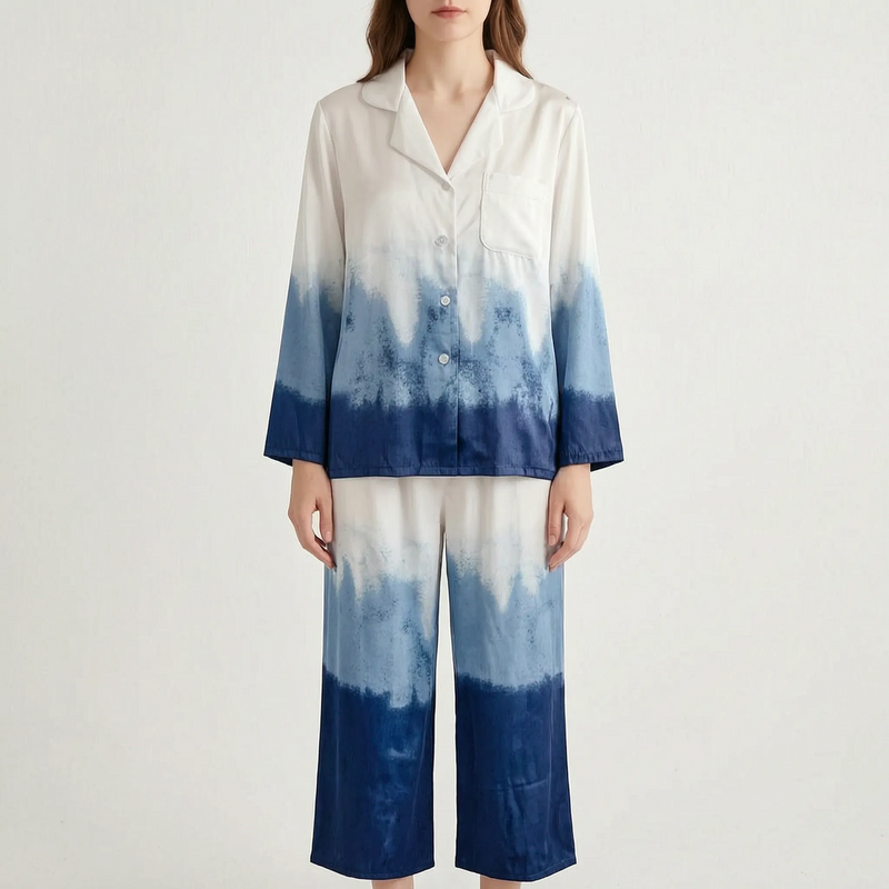Front view of the model in the white-to-navy ombre pyjama set with cropped wide-leg trousers against a light backdrop. 8