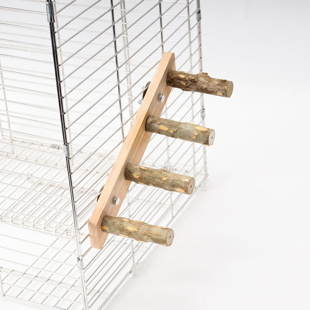 Four-rung wooden ladder with natural bark-covered branch rungs, bolted to the outside of a white wire cage on a plain background. 1