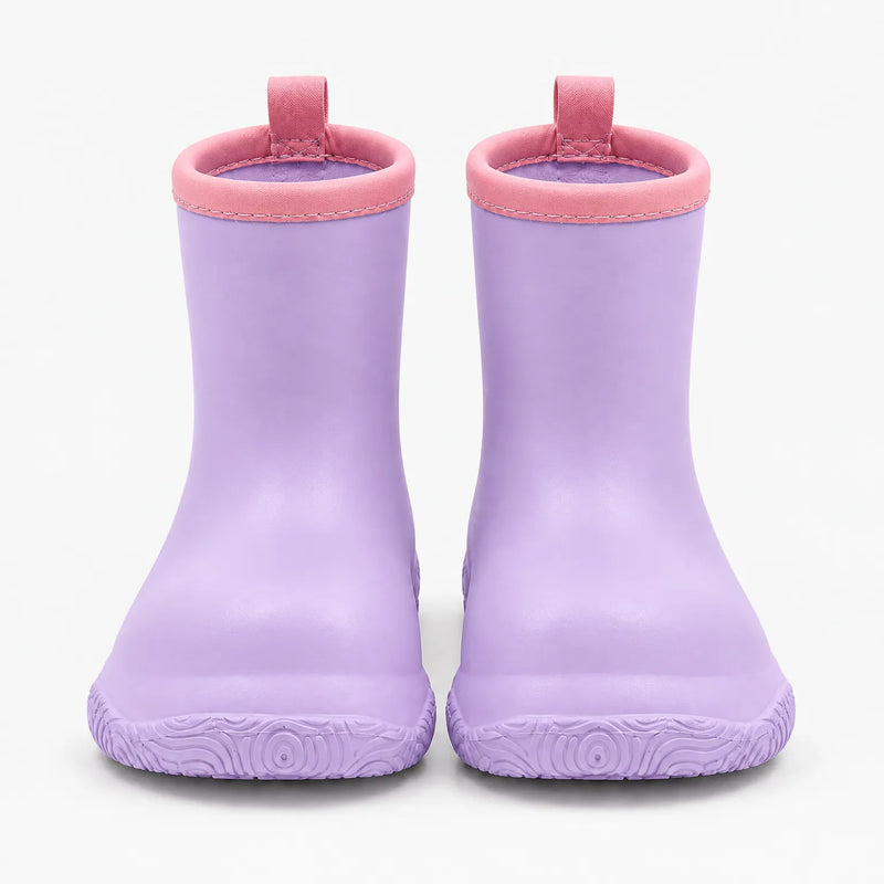 Front view of a pair of lilac wellies with pink stitched collars, pull loops and a swirl-patterned sole. 9