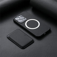 Black woven-texture case showing its circular magnetic ring, with the detached card wallet lying beside it 2