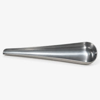 Empty tapered metal scoop lying on its side against a white background, showing the open channel and narrow spout. 4