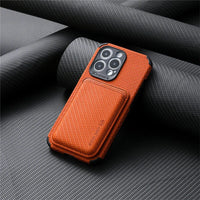 Orange woven-texture case with the magnetic card wallet attached, leaning on rolled dark fabric 5