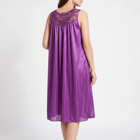 Back view of the purple satin nightgown, showing the sheer floral lace panel across the upper back and gathered, flowing skirt. 3