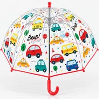Clear dome umbrella with red trim and handle, printed with colorful cars, taxis, buses and stop signs, seen from slightly below showing the ribs. 14