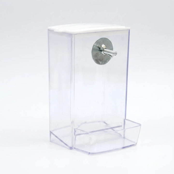 Empty clear feeder with a white lid, a metal washer and bolt for fixing to the cage, and a front tray. 4