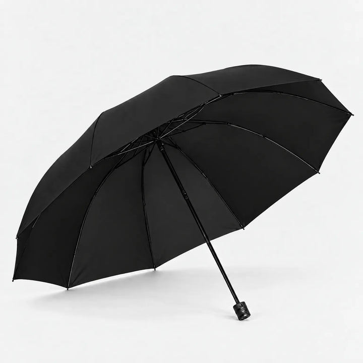 Open black umbrella tilted to show its underside, metal ribs and straight handle against a white background. 5