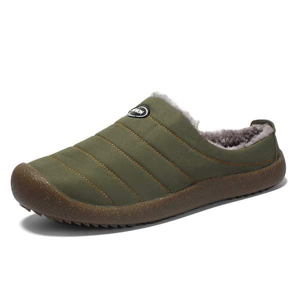 Single olive green quilted slipper with fleece lining and brown sole on a white background 13