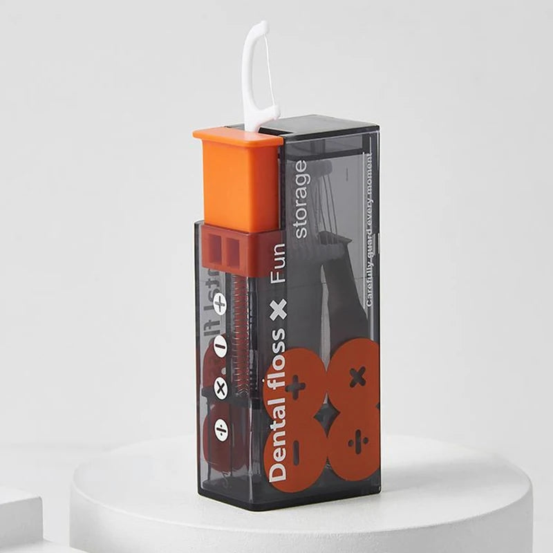 PORTABLE FLOSS DISPENSER WITH 10 AUTOMATICALLY EJECTED FLOSS STICKS-State of Style